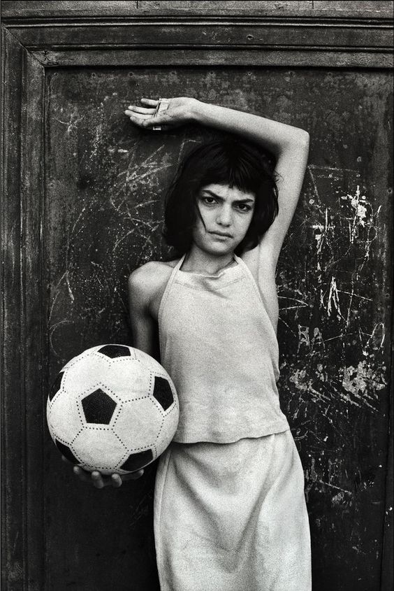 Letizia Battaglia- The girl with the ball, La Cala district.  Palermo, 1980
