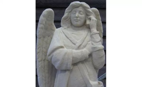 The angel talking on the mobile in the catholic cathedral of Saint John the Evangelist in the Netherlands